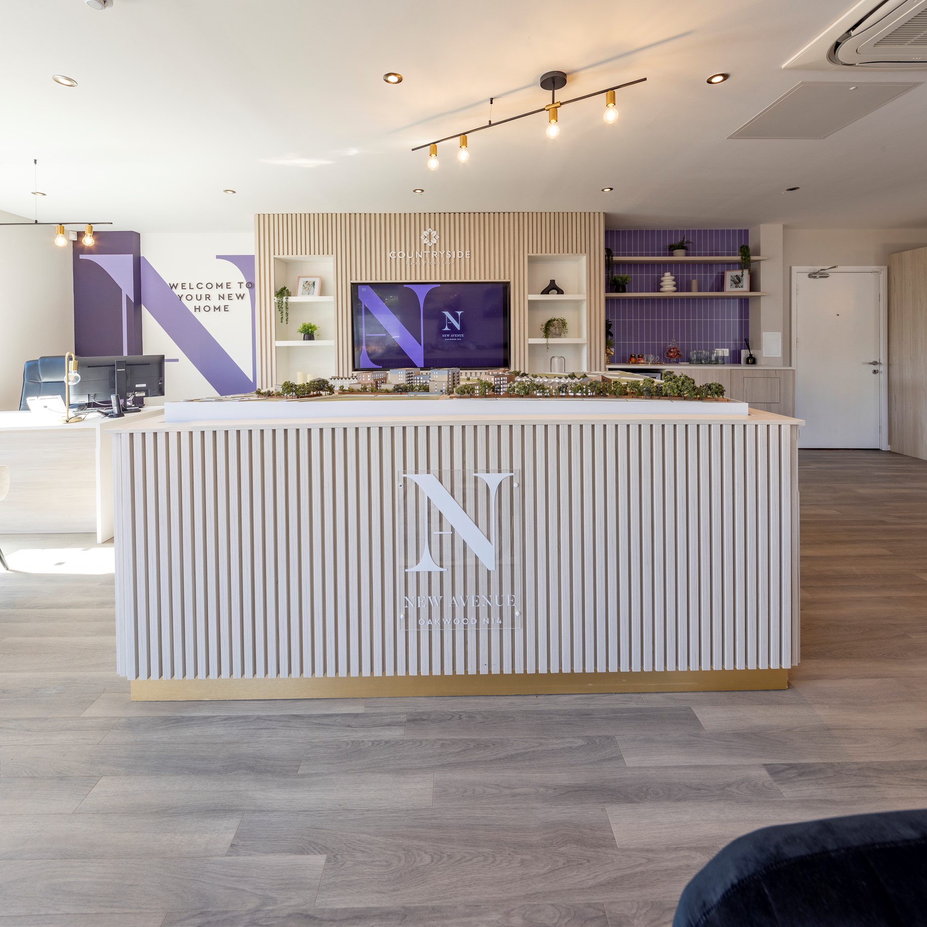 Bright marketing that uses lots of wooden furniture and the colour purple
