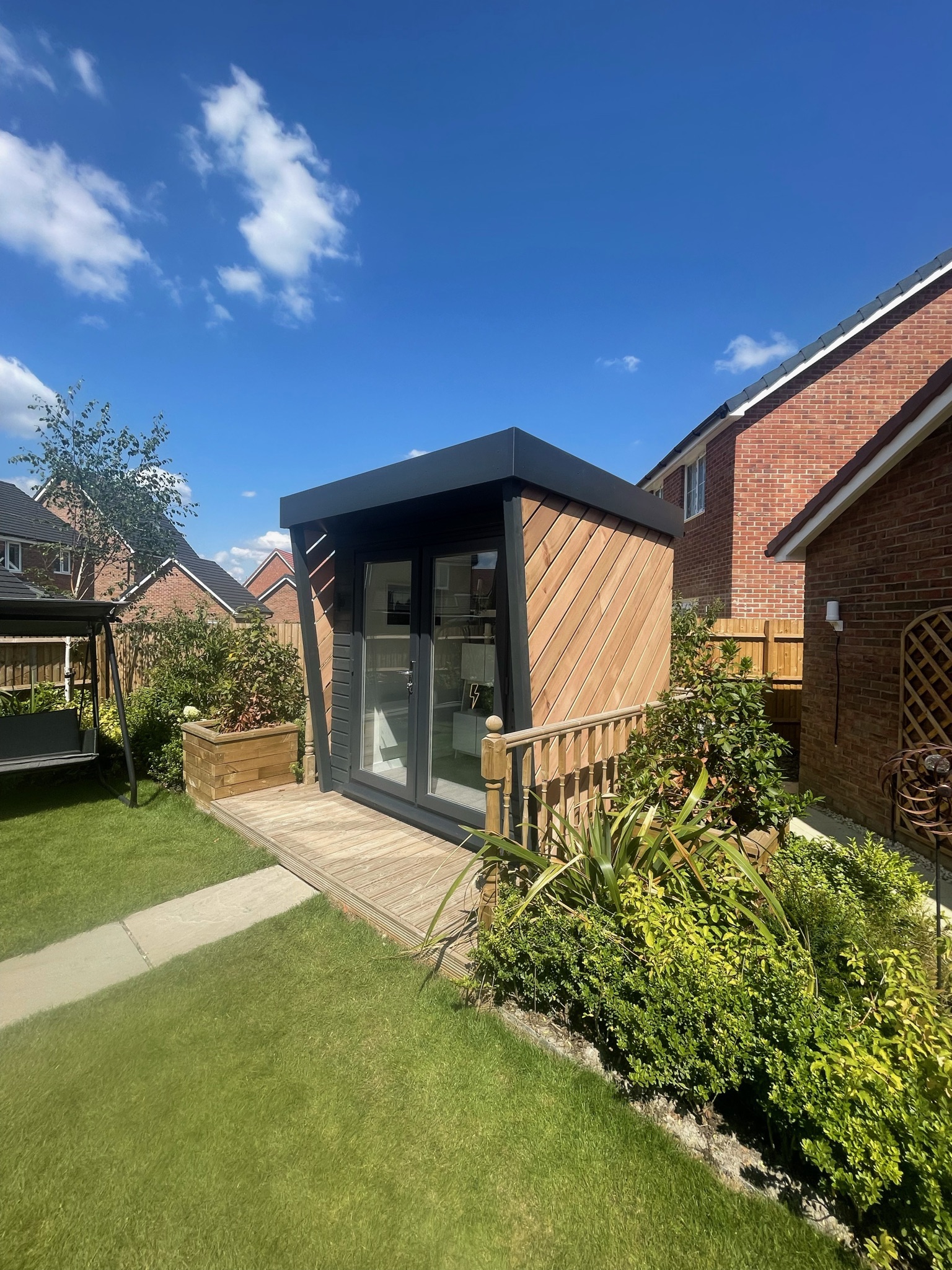 Small cabin at the end of a garden