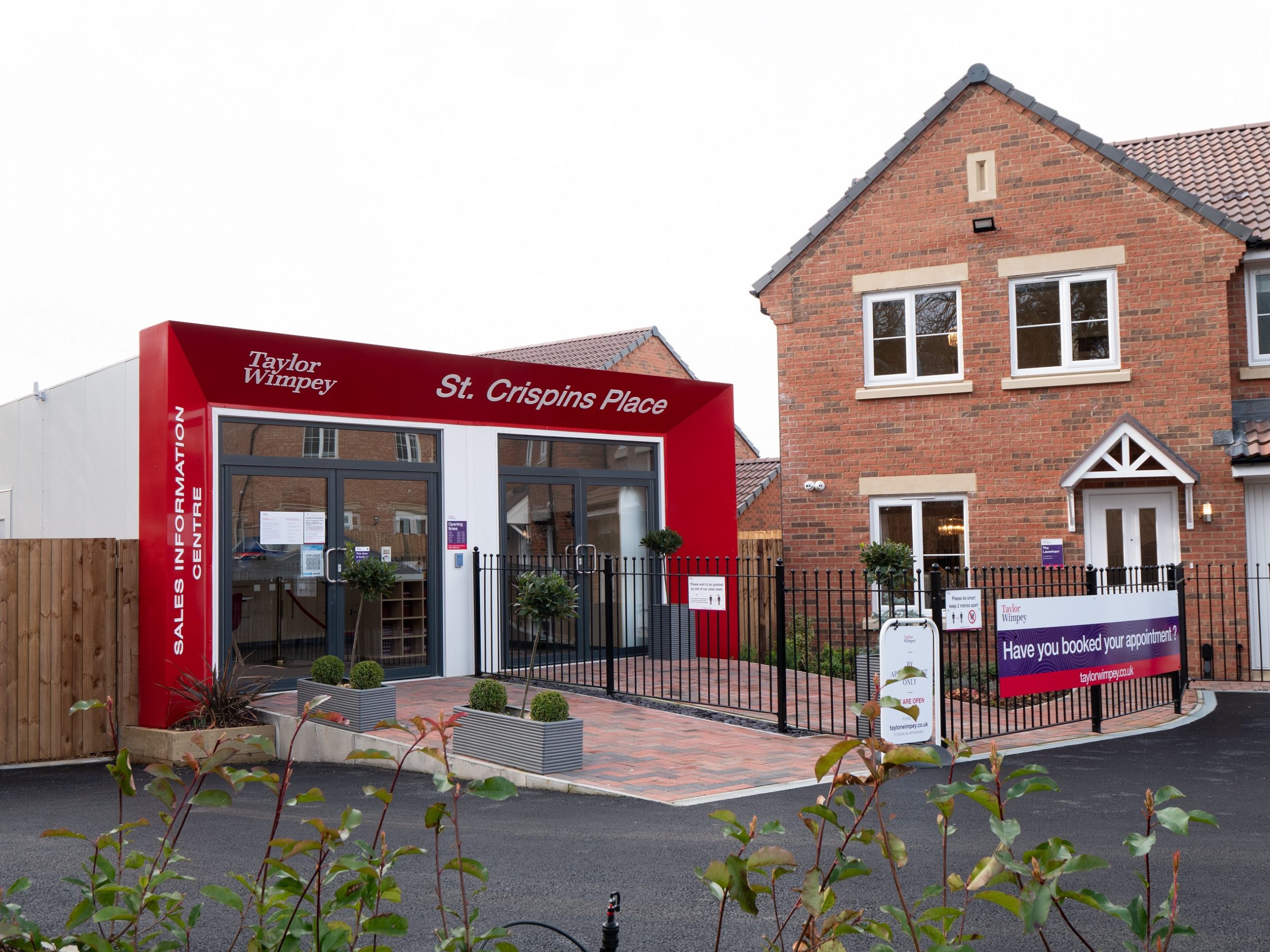 Marketing suite with a path that leads to a showcase house