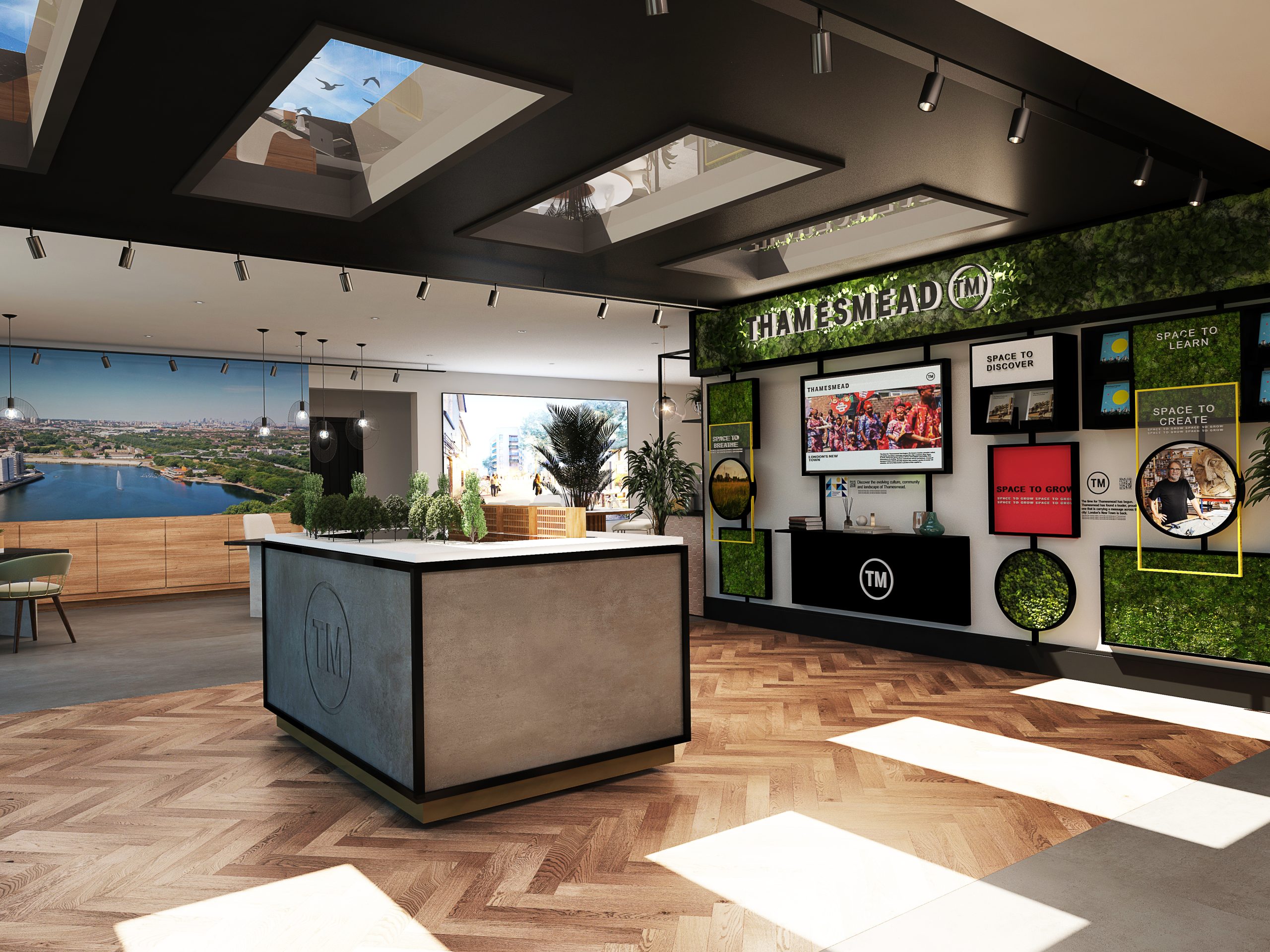 Marketing suite with sky roof windows and lots of pictures relating to the development