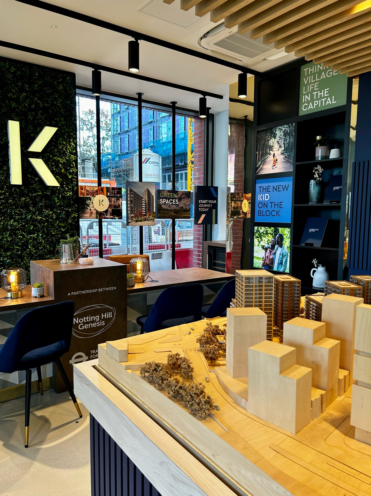 marketing suite with a large 3D model of the city around the development