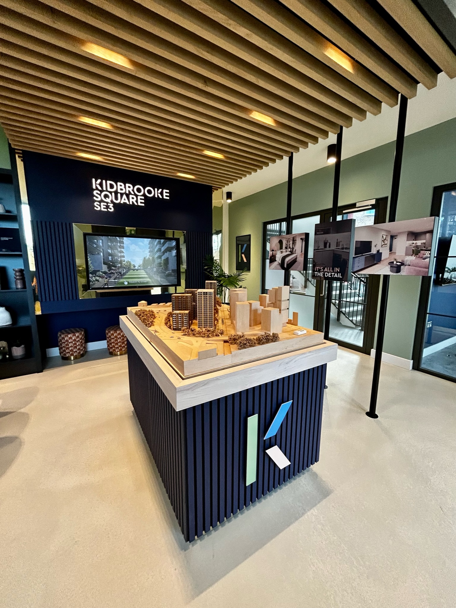 marketing suite with a large wooden 3D model of the city around the development